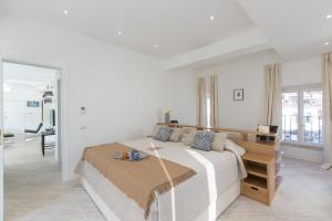 A bed or beds in a room at Amazing Penthouse Piazza Venezia