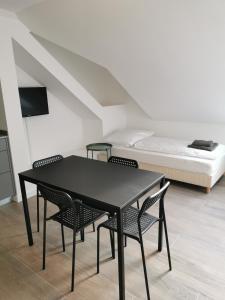 Postel nebo postele na pokoji v ubytování Sissi Apartments