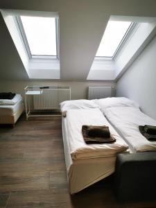 Postel nebo postele na pokoji v ubytování Sissi Apartments