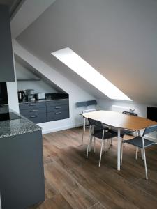 Kuchyň nebo kuchyňský kout v ubytování Sissi Apartments