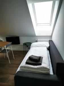 Postel nebo postele na pokoji v ubytování Sissi Apartments