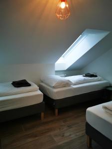 Postel nebo postele na pokoji v ubytování Sissi Apartments
