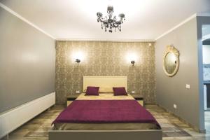 Ένα ή περισσότερα κρεβάτια σε δωμάτιο στο Holiday Apartments