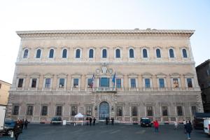 a large building with people standing outside of it at Navona Jacuzzi Rooms in Rome