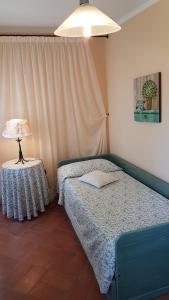Ein Bett oder Betten in einem Zimmer der Unterkunft Hotel Gallo Nero