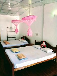 Postel nebo postele na pokoji v ubytování Margosa Guesthouse