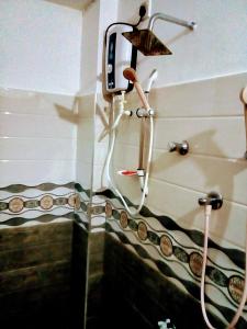 Koupelna v ubytování Margosa Guesthouse