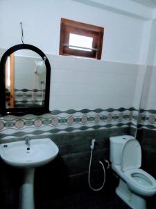 Koupelna v ubytování Margosa Guesthouse
