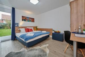 Postel nebo postele na pokoji v ubytování Sunny Hotel Straubing
