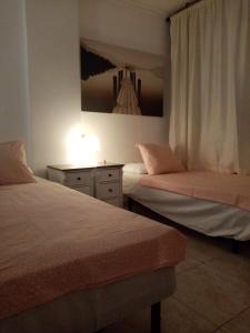 A bed or beds in a room at Apartment close to Yumbo,Free parking