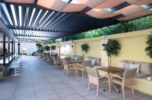 Reštaurácia alebo iné gastronomické zariadenie v ubytovaní Thalassa Beach Resort & Spa (Adults Only)