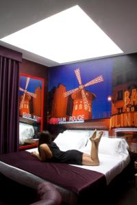 A bed or beds in a room at HM MotelHotel