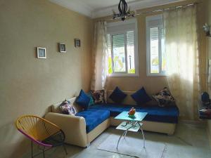 Area soggiorno di chic appart vue sur piscine