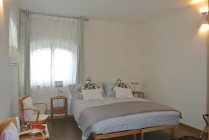 מיטה או מיטות בחדר ב-campagnoli