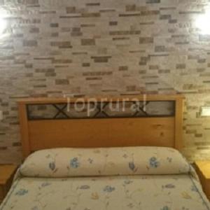 Ένα ή περισσότερα κρεβάτια σε δωμάτιο στο Casa Rural Villa Micleta