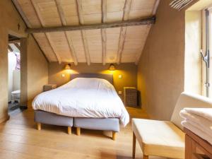 Voodi või voodid majutusasutuse Beautiful farmhouse in Beernem with big garden toas