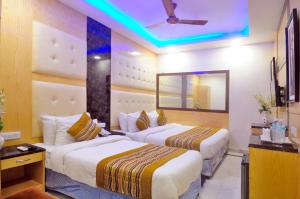 Postel nebo postele na pokoji v ubytování Hotel Karlo Kastle - Paharganj - New Delhi
