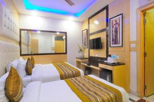 Postel nebo postele na pokoji v ubytování Hotel Karlo Kastle - Paharganj - New Delhi