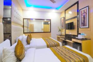 Postel nebo postele na pokoji v ubytování Hotel Karlo Kastle - Paharganj - New Delhi