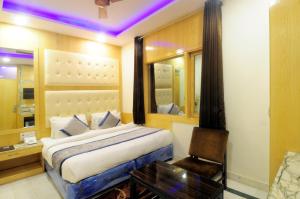 Postel nebo postele na pokoji v ubytování Hotel Karlo Kastle - Paharganj - New Delhi