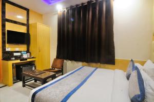 Postel nebo postele na pokoji v ubytování Hotel Karlo Kastle - Paharganj - New Delhi