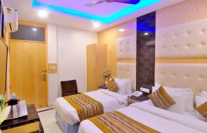 Postel nebo postele na pokoji v ubytování Hotel Karlo Kastle - Paharganj - New Delhi