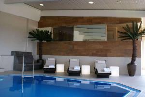 Bazén v ubytování Radisson Blu Hotel Cottbus nebo v jeho okolí