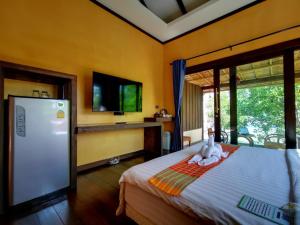 Ένα ή περισσότερα κρεβάτια σε δωμάτιο στο Relax House Lanta Old Town