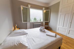 Ένα ή περισσότερα κρεβάτια σε δωμάτιο στο 5 bedroom house in Annecy between town and countryside