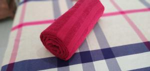 a red cloth napkin sitting on top of a table at Resident Villa in Unawatuna +93 photos
