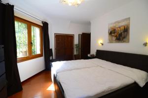 Posteľ alebo postele v izbe v ubytovaní VILLA GARBINELL