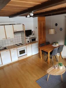 Kuchyň nebo kuchyňský kout v ubytování Villa Zeppelin - App Smaragd + 11 fotografií