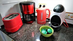 Coffee and tea making facilities at Carmen Seaview & Beach - Apartment