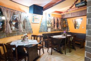 A restaurant or other place to eat at The Castle Complex