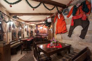 A restaurant or other place to eat at The Castle Complex