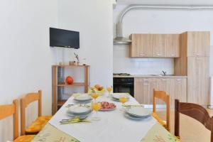 Kuchyň nebo kuchyňský kout v ubytování Apartments Lavanda