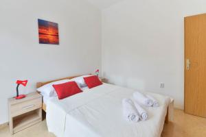 Postel nebo postele na pokoji v ubytování Apartments Lavanda