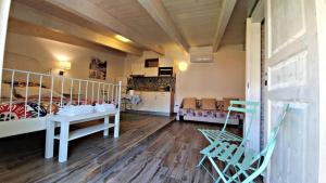Postel nebo postele na pokoji v ubytování B&B A casa di Antonella