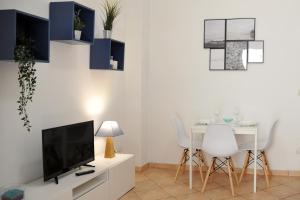 TV a/nebo společenská místnost v ubytování Casa Salonia