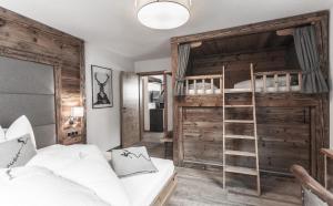 Posteľ alebo postele v izbe v ubytovaní Chalet Nr.121