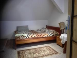 Łóżko lub łóżka w pokoju w obiekcie Noclegi16