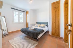 Posteľ alebo postele v izbe v ubytovaní Bed and Snow Apartments