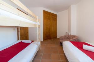 Posteľ alebo postele v izbe v ubytovaní Bed and Snow Apartments