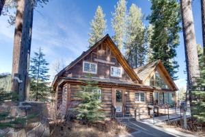 a log cabin in the woods at Scott Peak Views in Alpine Meadows