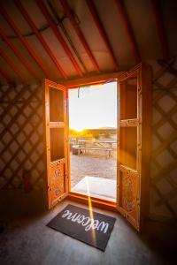 a door that is open in a small room at 28 Palms Ranch in Twentynine Palms