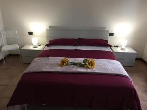 Кровать или кровати в номере Apartment Annarosa