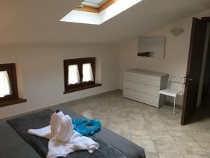 Postel nebo postele na pokoji v ubytování Apartment Annarosa + 15 fotografií