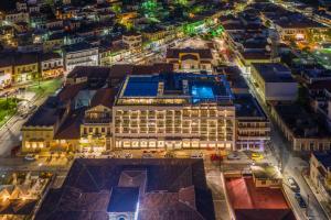 an aerial view of a city at night at LAS HOTEL & SPA in Gythio