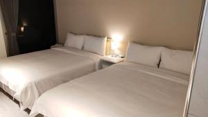 Katil atau katil-katil dalam bilik di 駐駐逢甲 Shine Residence
