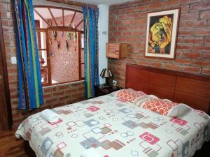 Ένα ή περισσότερα κρεβάτια σε δωμάτιο στο Hostal D´Mathias